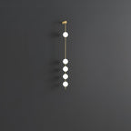 Lustra Applique Murale Sphères Verticales Laiton